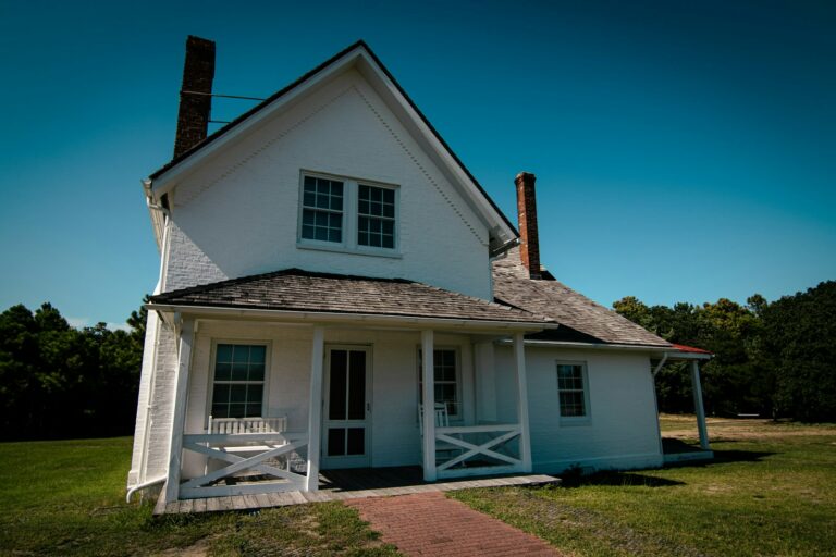 a white house with a chimney