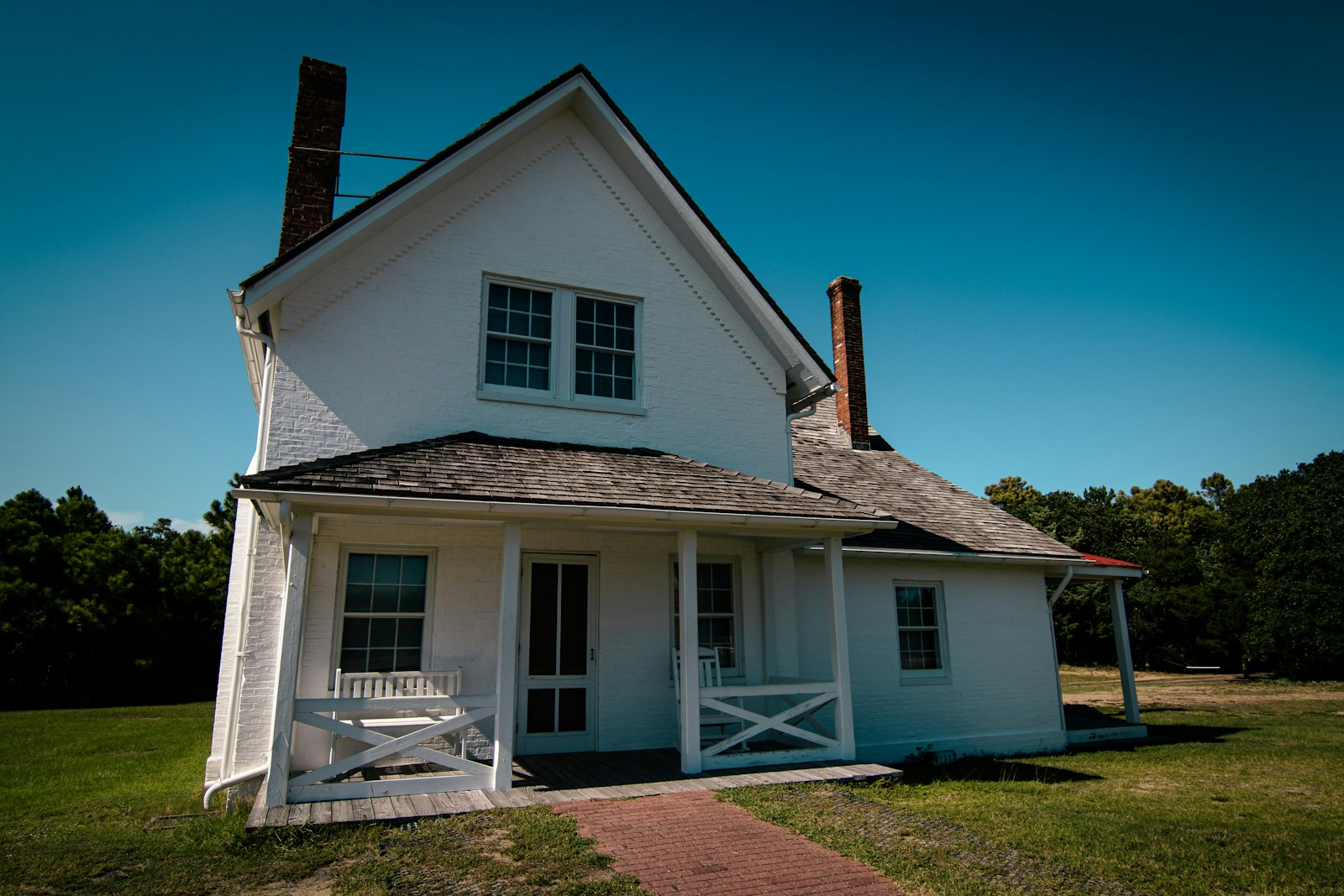 a white house with a chimney
